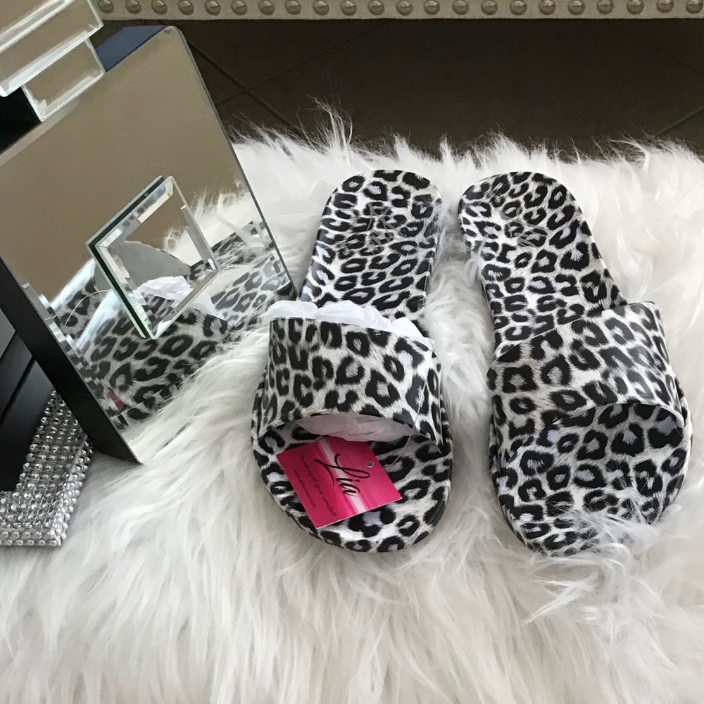 LIA WHITE AND BLACK LEOPARD CHEETAH JELLY SANDALS